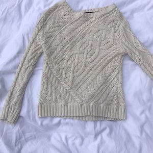 A beige Ralph Lauren cable knit sweater. Size M.